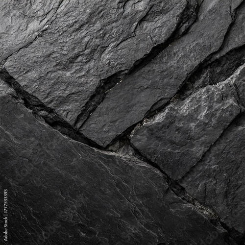 Rock texture with cracks,black stone background with copy space for design.