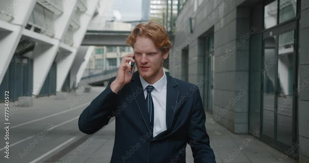 Businessman stands on street phone conversation close-up. This phone conversation reflects his leadership and vision. Each aspect of phone conversation underscores his commitment to teamwork. Businessman stands on street phone conversation close-up. This phone conversation reflects his leadership and vision. Each aspect of phone conversation underscores his commitment to teamwork.