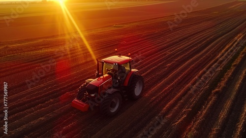 Dramatic Sunset Scene on Soybean Plantation with Tractor