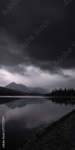 nature. cloudy nature. the gloomy forest. a lake in the mountains. grey clouds in the mountains. gloomy nature photo