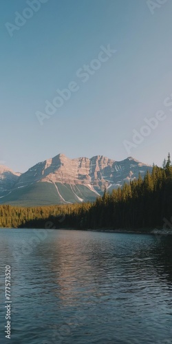 nature. lake in the mountains, mountain forest. snow-capped mountains. mountain range photo