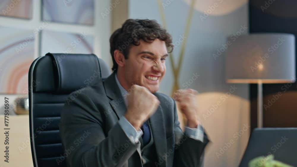 Excited winner rejoicing workplace reading great news at laptop closeup. Man joy