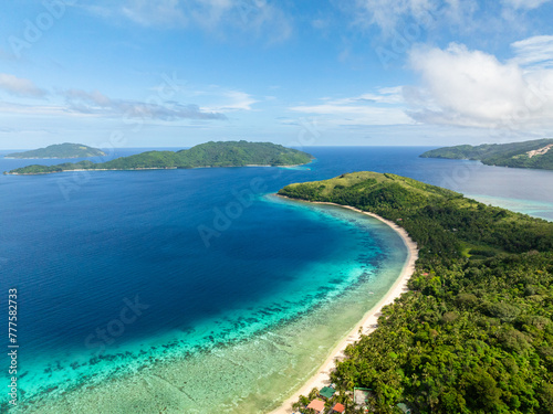 Tropical Island with beaches at coastline surrounded by blue sea. Romblon, Philippines.