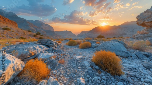 Sun Setting Over Rocky Landscape