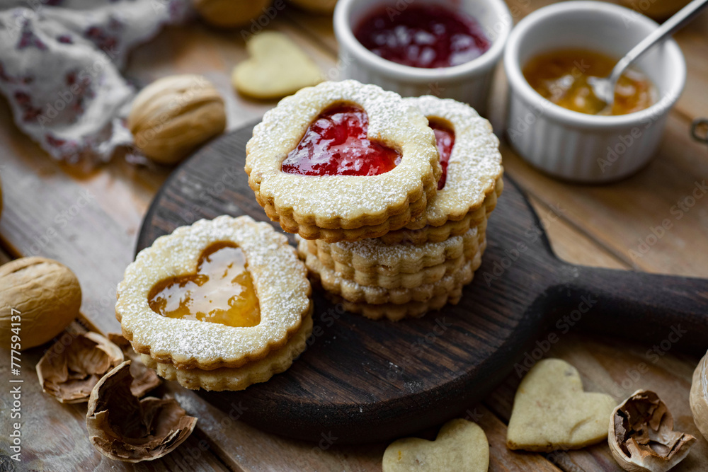 Sweet dessert: Austrian cookies Linzer with strawberry jam. Sweet cookies for Valentine's Day.