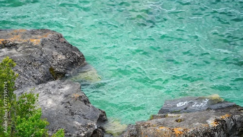 Waves hitting rocky shoreline