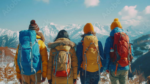 Group of Hikers Standing in Front of Mountain