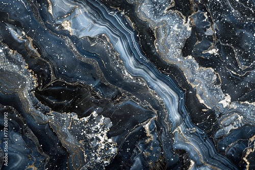 Deep blue marble with swirling white veins  infused with sparkling graphite flakes  resembling a celestial map and evoking feelings of wonder and vastness.