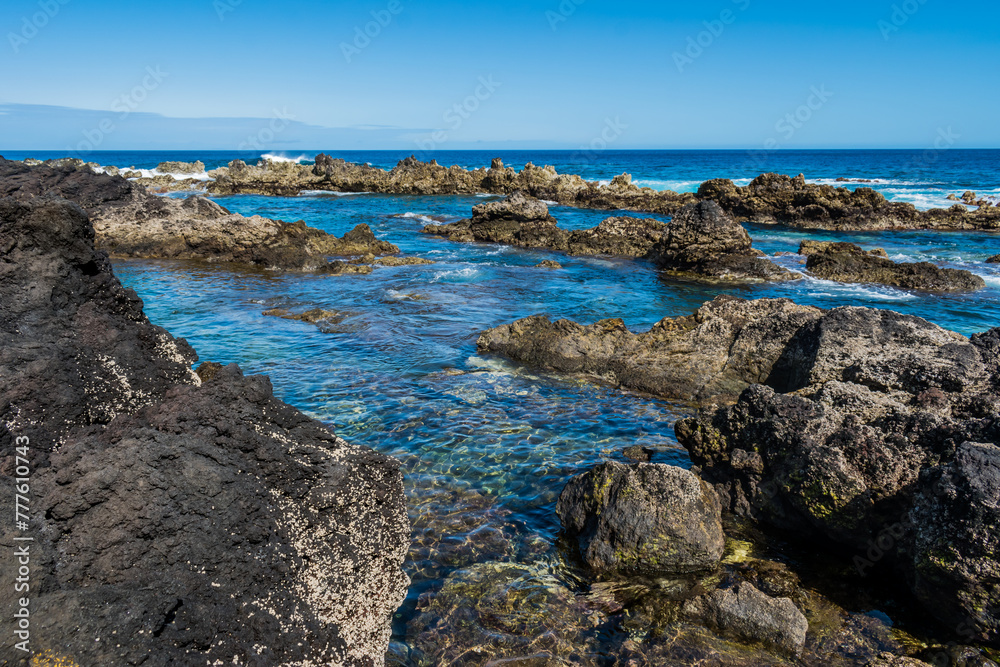 Landscape with clear sea water in the natural pools of Biscoitos with volcanic rocks, Terceira - Azores PORTUGAL