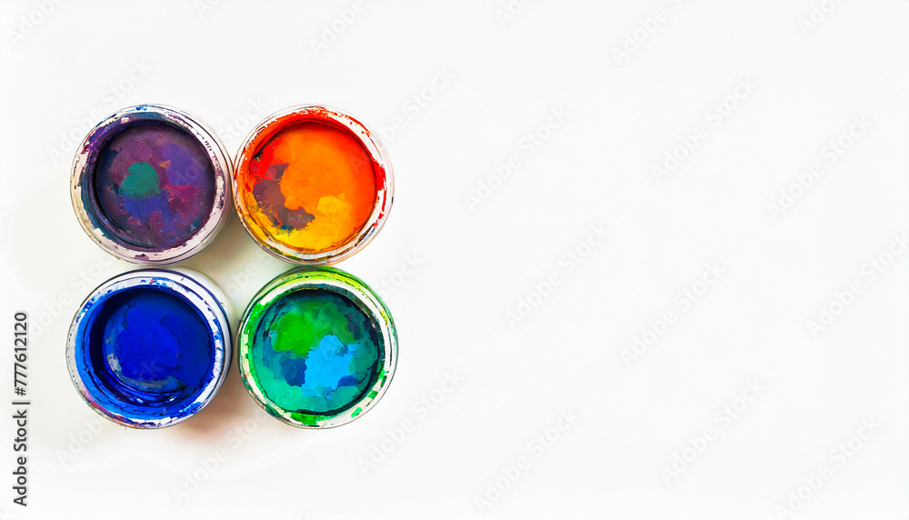 Paints isolated on white background, top view with space for text Paints isolated on white background, top view with space for text