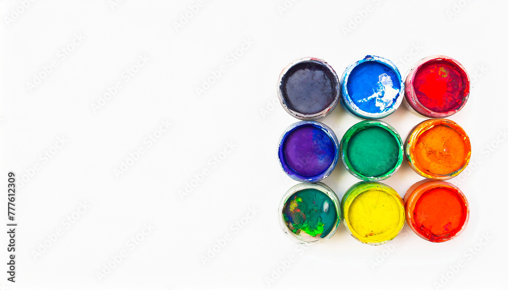 Paints isolated on white background, top view with space for text Paints isolated on white background, top view with space for text