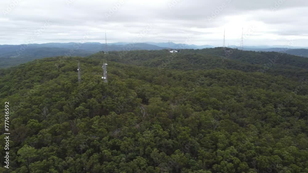 4K aerial drone shot of Tv towers located top of a mountain in Australia 4K aerial drone shot of Tv towers located top of a mountain in Australia