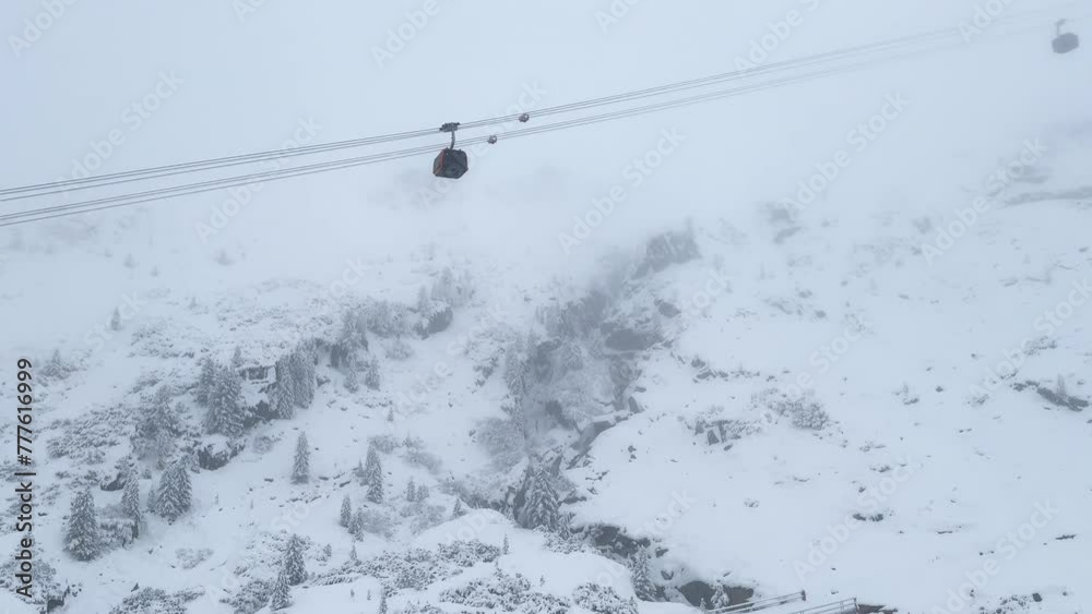 First snow snowing white out blizzard October November fall autumn Gondola Tram chairlift ride Stubai Stubaital glacier ski resort Tyrol Innsbruck Austrian Europe Alps trail run down mountain pan