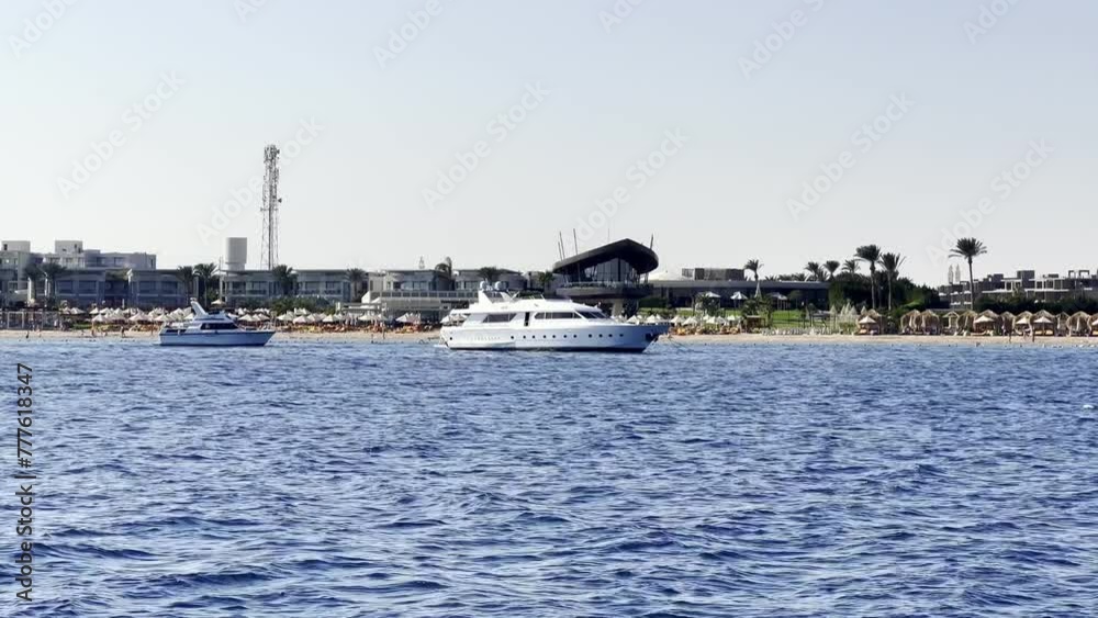Luxury Ships Near Sea Coast Of Hurghada On The Red Sea In Egypt. Wide Shot Luxury Ships Near Sea Coast Of Hurghada On The Red Sea In Egypt. Wide Shot