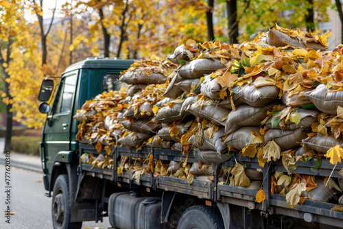 A truck is filled with bags of leaves