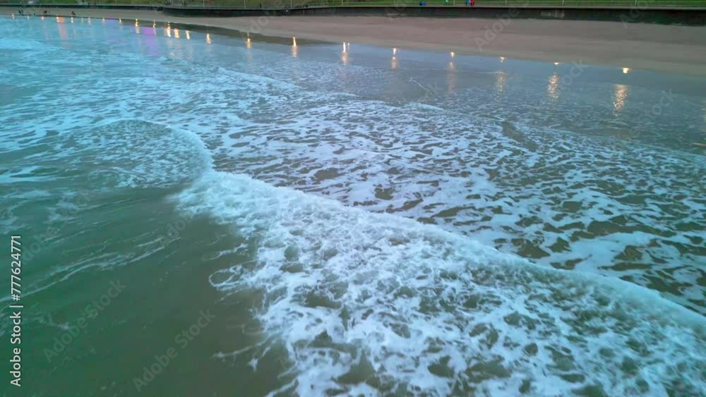 Vidéo Stock Aerial footage of the tide as it reaches Portrush West ...