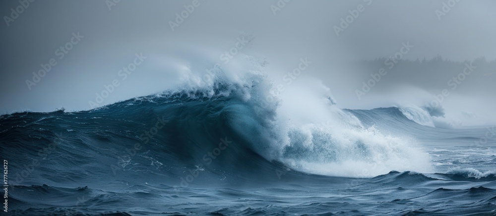 A gigantic wave, formed in the midst of the ocean, crashes with immense force, creating a spectacular display of power and energy. A gigantic wave, formed in the midst of the ocean, crashes with immense force, creating a spectacular display of power and energy.