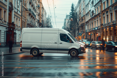 White delivery van driving down a city street