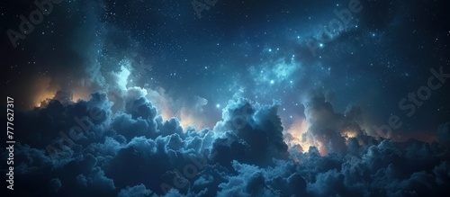 A vast night sky filled with thick clouds and twinkling stars, creating a dramatic and mysterious atmosphere. photo