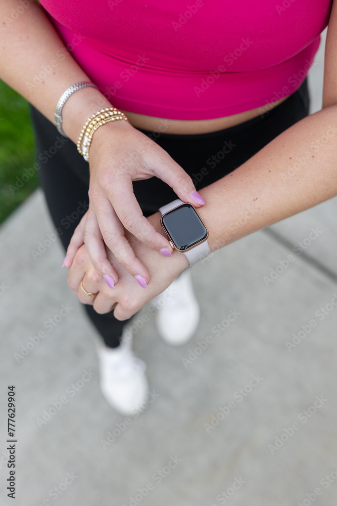 Fashionable smartwatch on fitness enthusiast