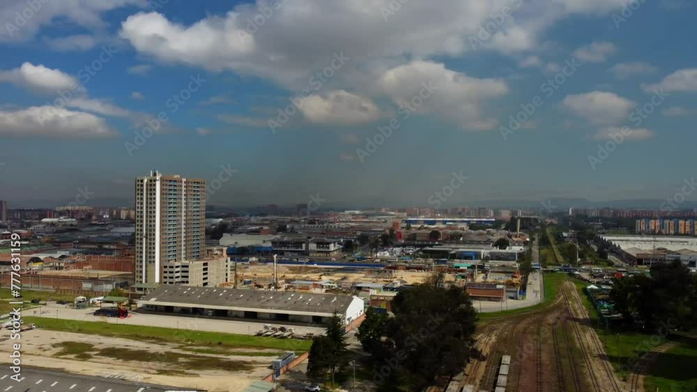 As the drone gracefully glides over the bustling streets of Bogotá, the city's vibrant energy sets the stage for our exploration. Yaw Right As the drone gracefully glides over the bustling streets of Bogotá, the city's vibrant energy sets the stage for our exploration. Yaw Right