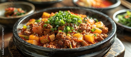 A close-up view of a bowl filled with delicious Korean rice on a wooden table.