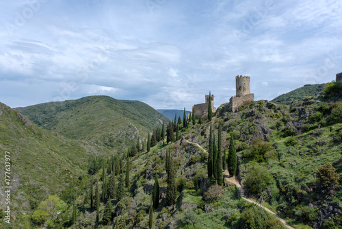Aerial view of a castle and hills