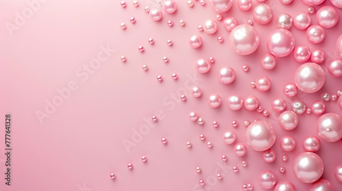 pink mother of pearl pearls on a pink background with copy space