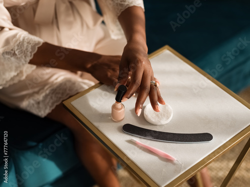 Woman doing painting at home photo