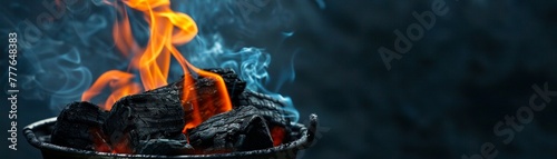 Simple icon of a flaming charcoal briquette, essence of grilling captured against a calming solid backdrop. photo