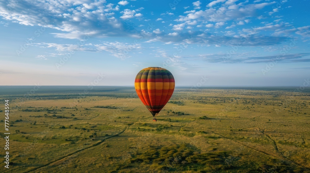 Obraz premium hot air balloon soaring high in the endless blue sky!