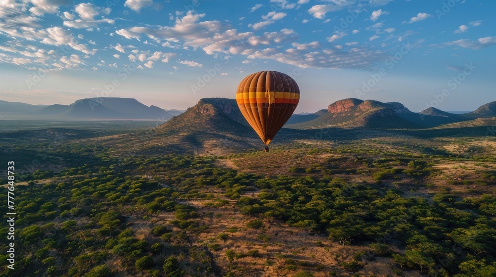 Obraz premium hot air balloon soaring high in the endless blue sky!