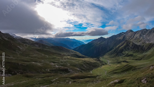 Panoramic view of majestic mountain peaks of High Tauern seen from Feldseekopf, Carinthia Salzburg, Austria. Idyllic hiking trail in Goldberg group in wilderness of Austrian Alps. Wanderlust. Tranquil