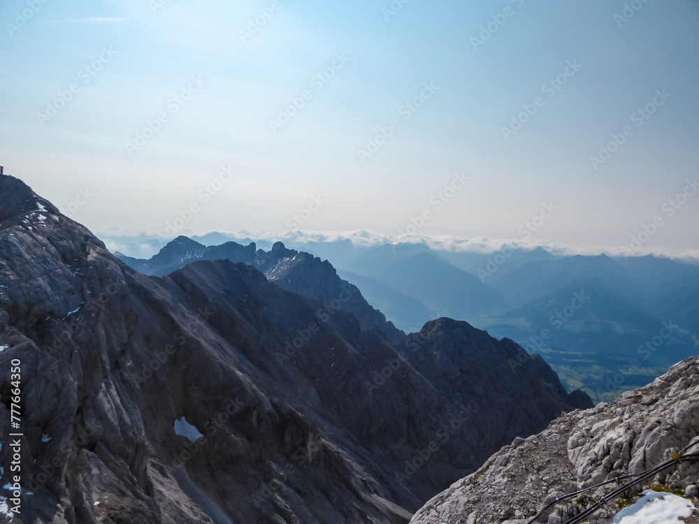 Panoramic view of majestic mountain peak Dachstein in Northern Limestone Alps, Styria, Austria. Scenic hiking trail in wilderness Austrian Alps. Peace of mind, calmness. Wanderlust in nature