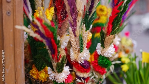 Obraz na plátne Traditional Polish Easter Symbolic Decoration Palms Sold on Outdoor Stand for Pa