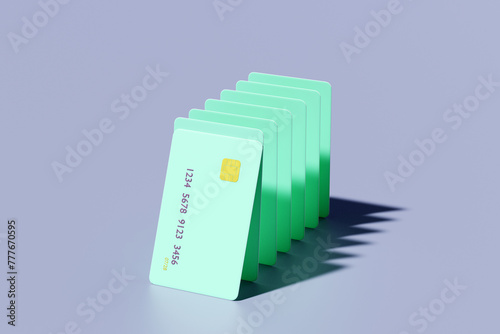 Credit cards arranged as falling dominoes. Personal debt/loan concept  photo