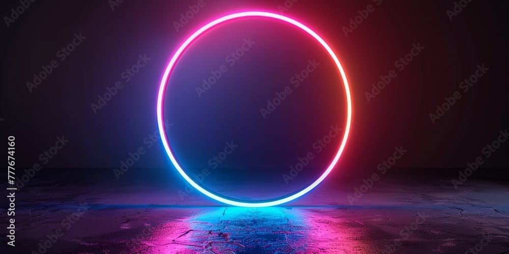 A neon colored circle is lit up in a dark room A neon colored circle is lit up in a dark room