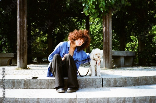 Wallpaper Mural A woman with a dog outdoors Torontodigital.ca