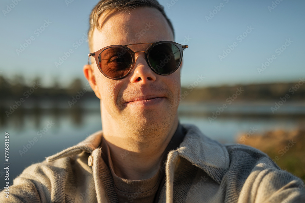 UGC selfie of man with down syndrome in nature UGC selfie of man with down syndrome in nature