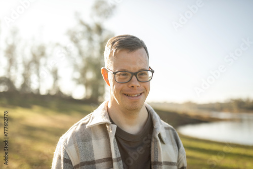 man with down syndrome in nature