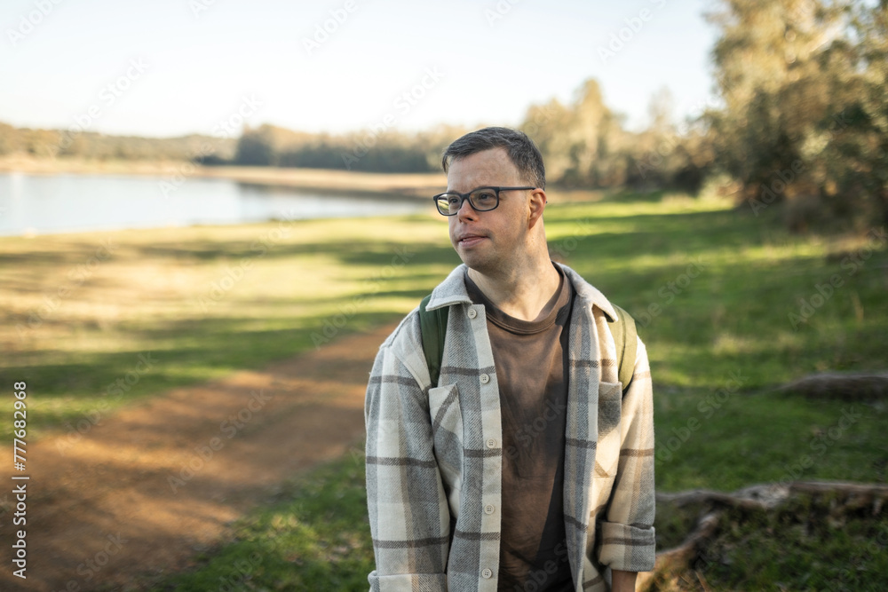 man with down syndrome in nature man with down syndrome in nature