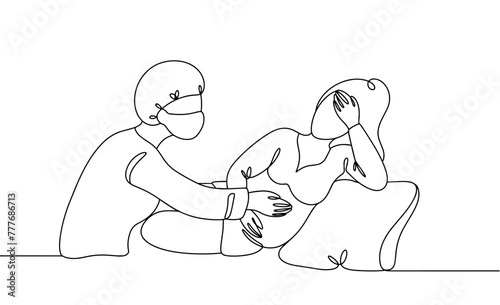 Midwife and woman in labor