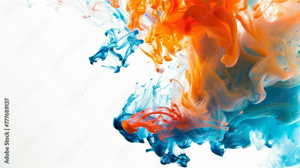 Vibrant orange and blue ink swirls in water on a white background. Dynamic fluid art for creative design