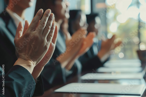 Contemporary business people hands clapping at conference