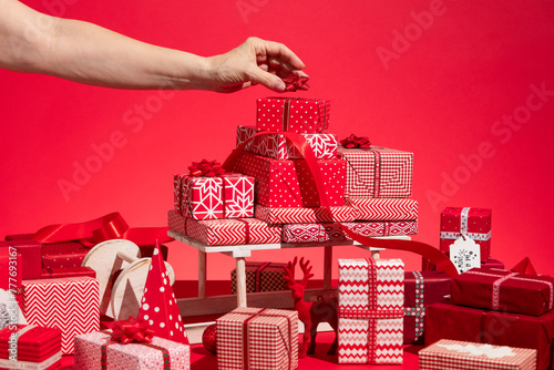Christmas presents. Red and white themed gift holiday background.