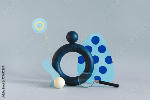 Different colored objects together on paper background