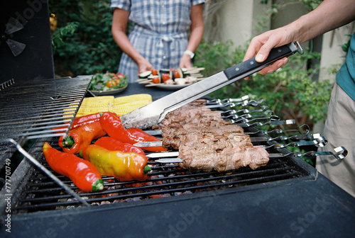 Vegetables and meat on BBQ photo