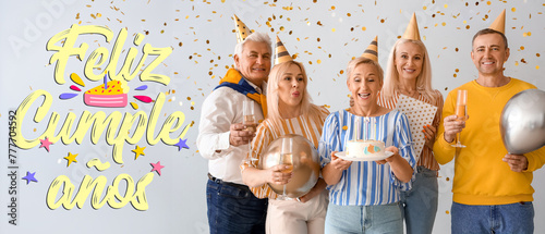 Mature people with cake and...