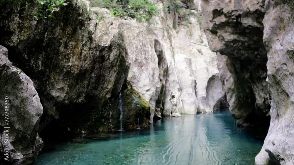 Explore hidden canyon with turquoise, river waters. See serene turquoise, river in narrow canyon. Discover tranquil turquoise, river beauty, secluded and pristine Explore hidden canyon with turquoise, river waters. See serene turquoise, river in narrow canyon. Discover tranquil turquoise, river beauty, secluded and pristine