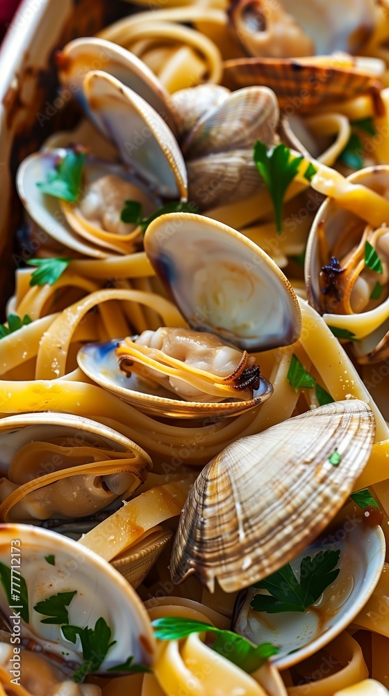 Gourmet Delight: Steamed Clams and Linguini Masterpiece in Casserole Gourmet Delight: Steamed Clams and Linguini Masterpiece in Casserole